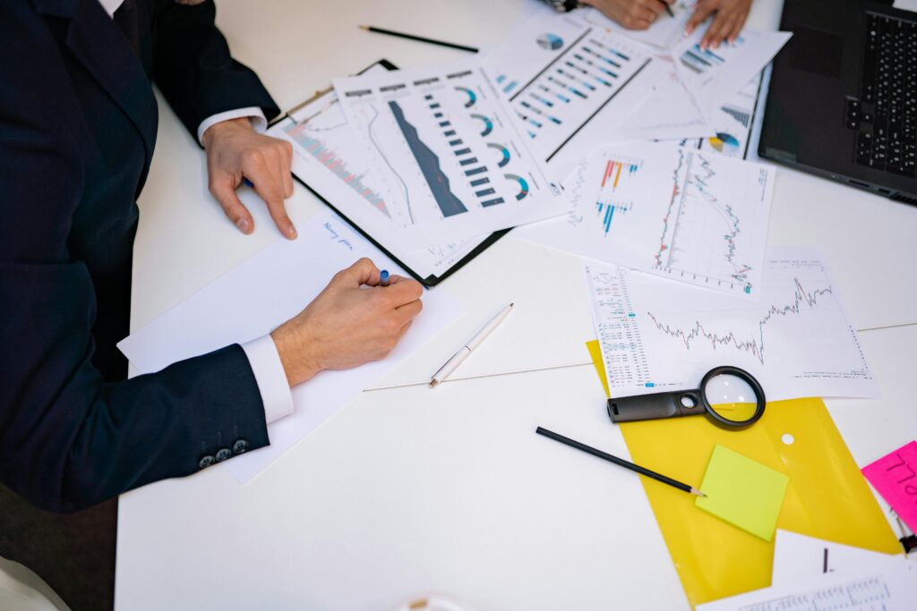 Business owner reviewing Google Ads performance with agency.